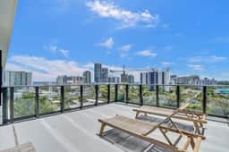 Elegant 1BR Retreat | Pool Deck, Gym & Beach - Image 2
