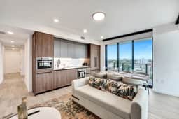 Stylish 3BR Retreat | Balcony, Pool & Beach Access - Image 2