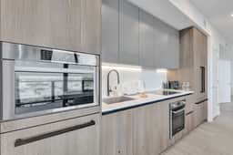 Elegant 4BR, 16th Floor | Balcony, Pool & Gym - Image 5