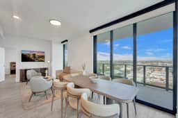 Elegant 4BR, 16th Floor | Balcony, Pool & Gym - Image 3
